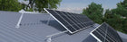 Mibet MRac tilt frames raising solar panels on a corrugated metal roof